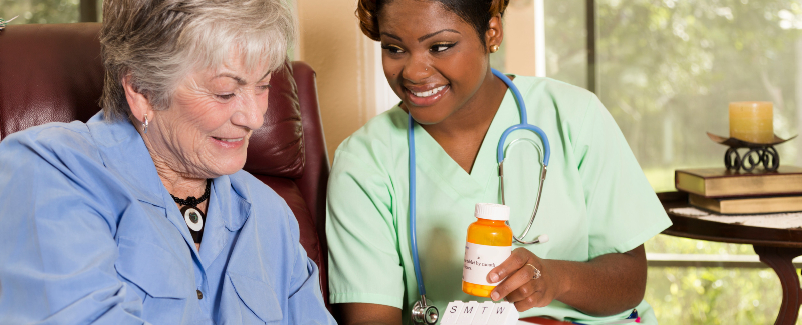 Nurse assisting with organizing medication.